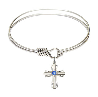 6 1/4 inch Round Eye Hook Rhodium Bangle Bracelet with a Sterling Silver Cross charm.