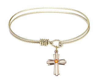 6 1/4 inch Oval Eye Hook Hamilton Gold Bangle Bracelet with a 14kt Gold Filled Cross charm.