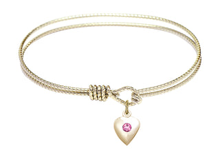 6 1/4 inch Oval Eye Hook Hamilton Gold Bangle Bracelet with a 14kt Gold Filled Heart charm.