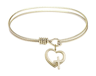 6 1/4 inch Oval Eye Hook Hamilton Gold Bangle Bracelet with a 14kt Gold Filled Heart / Cross charm.