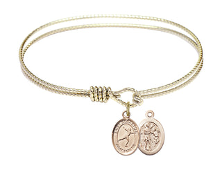 6 1/4 inch Oval Eye Hook Hamilton Gold Bangle Bracelet with a 14kt Gold Filled Saint Sebastian/Figure Skating charm.