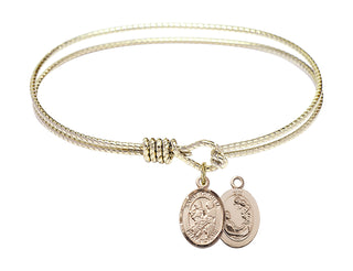 6 1/4 inch Oval Eye Hook Hamilton Gold Bangle Bracelet with a 14kt Gold Filled Saint Cecilia / Marching Band charm.