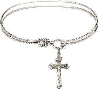 Bangle Bracelet with a Crucifix charm.