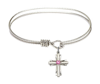 6 1/4 inch Oval Eye Hook Rhodium Bangle Bracelet with a Sterling Silver Cross charm.