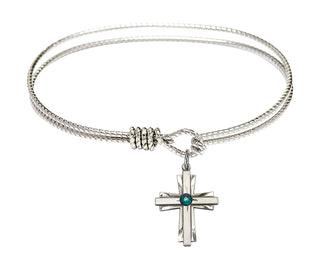 6 1/4 inch Oval Eye Hook Rhodium Bangle Bracelet with a Sterling Silver Cross charm.