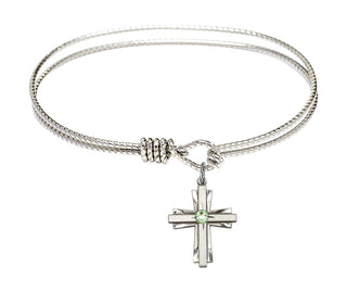 6 1/4 inch Oval Eye Hook Rhodium Bangle Bracelet with a Sterling Silver Cross charm.