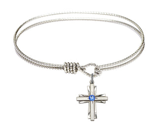 6 1/4 inch Oval Eye Hook Rhodium Bangle Bracelet with a Sterling Silver Cross charm.