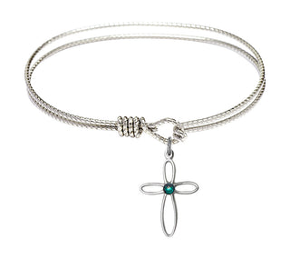 6 1/4 inch Oval Eye Hook Rhodium Bangle Bracelet with a Sterling Silver Loop Cross charm.