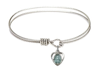 6 1/4 inch Oval Eye Hook Rhodium Bangle Bracelet with a Sterling Silver Miraculous Heart charm.
