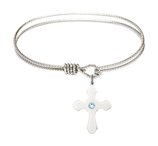 6 1/4 inch Oval Eye Hook Rhodium Bangle Bracelet with a Sterling Silver Cross charm.