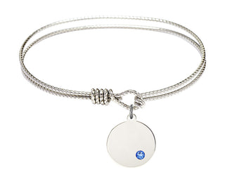 6 1/4 inch Oval Eye Hook Rhodium Bangle Bracelet with a Sterling Silver Plain Disc charm.