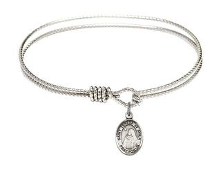 6 1/4 inch Oval Eye Hook Rhodium Bangle Bracelet with a Sterling Silver Saint Teresa of Avila charm. Engraved Catholic Saint Jewelry
