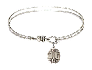 6 1/4 inch Oval Eye Hook Rhodium Bangle Bracelet with a Sterling Silver Our Lady of Kibeho charm. Engraved Catholic Saint Jewelry