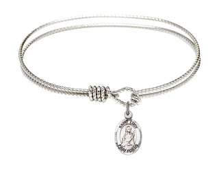 6 1/4 inch Oval Eye Hook Rhodium Bangle Bracelet with a Sterling Silver Saint Lucy charm. Engraved Catholic Saint Jewelry