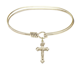 7 inch Oval Eye Hook Hamilton Gold Bangle Bracelet with a 14kt Gold Filled Crucifix charm.