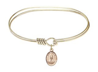 7 inch Oval Eye Hook Hamilton Gold Bangle Bracelet with a 14kt Gold Filled Saint Anselm of Canterbury charm. Engraved Catholic Saint Jewelry