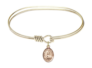 7 inch Oval Eye Hook Hamilton Gold Bangle Bracelet with a 14kt Gold Filled Saint Kateri Tekakwitha charm. Engraved Catholic Saint Jewelry