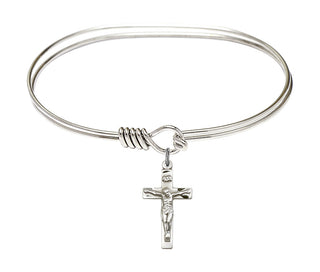 7 inch Oval Eye Hook Rhodium Bangle Bracelet with a Sterling Silver Crucifix charm.