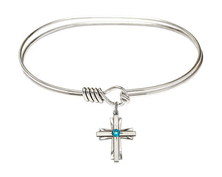 7 inch Oval Eye Hook Rhodium Bangle Bracelet with a Sterling Silver Cross charm.