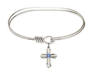 7 inch Oval Eye Hook Rhodium Bangle Bracelet with a Sterling Silver Cross charm.