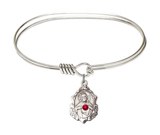 7 inch Oval Eye Hook Rhodium Bangle Bracelet with a Sterling Silver Scapular charm.