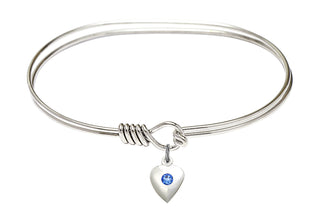 7 inch Oval Eye Hook Rhodium Bangle Bracelet with a Sterling Silver Heart charm.