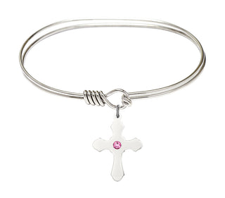 7 inch Oval Eye Hook Rhodium Bangle Bracelet with a Sterling Silver Cross charm.
