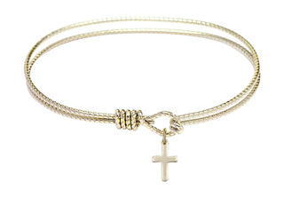 7 1/4 inch Oval Eye Hook Hamilton Gold Bangle Bracelet with a 14kt Gold Filled Cross charm.