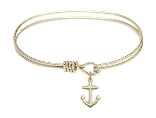 7 1/4 inch Oval Eye Hook Hamilton Gold Bangle Bracelet with a 14kt Gold Filled Anchor charm.