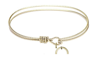 7 1/4 inch Oval Eye Hook Hamilton Gold Bangle Bracelet with a 14kt Gold Filled Anchor charm.