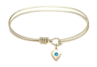 7 1/4 inch Oval Eye Hook Hamilton Gold Bangle Bracelet with a 14kt Gold Filled Heart charm.