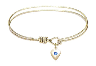 7 1/4 inch Oval Eye Hook Hamilton Gold Bangle Bracelet with a 14kt Gold Filled Heart charm.