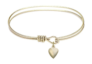 7 1/4 inch Oval Eye Hook Hamilton Gold Bangle Bracelet with a 14kt Gold Filled Heart charm.