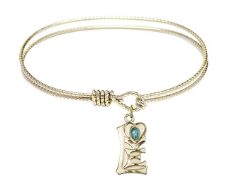7 1/4 inch Oval Eye Hook Hamilton Gold Bangle Bracelet with a 14kt Gold Filled Miraculous charm.