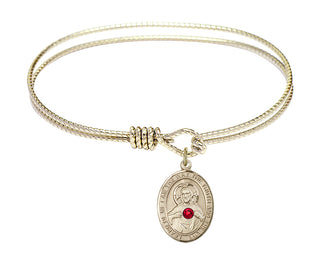 7 1/4 inch Oval Eye Hook Hamilton Gold Bangle Bracelet with a 14kt Gold Filled Scapular charm.