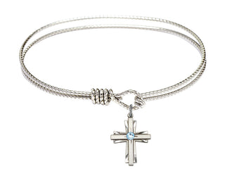 7 1/4 inch Oval Eye Hook Rhodium Bangle Bracelet with a Sterling Silver Cross charm.