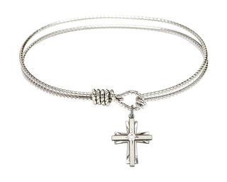 7 1/4 inch Oval Eye Hook Rhodium Bangle Bracelet with a Sterling Silver Cross charm.
