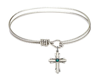 7 1/4 inch Oval Eye Hook Rhodium Bangle Bracelet with a Sterling Silver Cross charm.