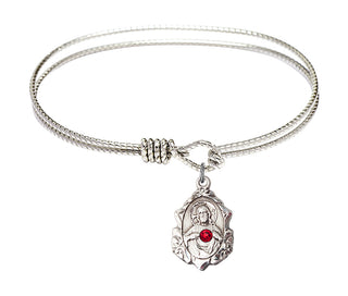 7 1/4 inch Oval Eye Hook Rhodium Bangle Bracelet with a Sterling Silver Scapular charm.