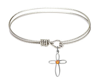 7 1/4 inch Oval Eye Hook Rhodium Bangle Bracelet with a Sterling Silver Loop Cross charm.