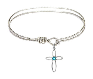 7 1/4 inch Oval Eye Hook Rhodium Bangle Bracelet with a Sterling Silver Loop Cross charm.