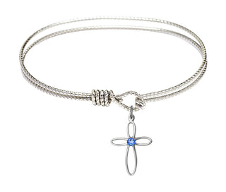 7 1/4 inch Oval Eye Hook Rhodium Bangle Bracelet with a Sterling Silver Loop Cross charm.