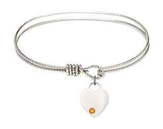 7 1/4 inch Oval Eye Hook Rhodium Bangle Bracelet with a Sterling Silver Heart charm. Engraved Catholic Saint Jewelry