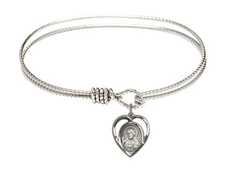 7 1/4 inch Oval Eye Hook Rhodium Bangle Bracelet with a Sterling Silver Scapular charm.