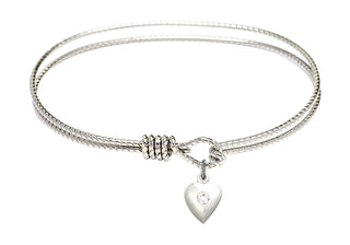 7 1/4 inch Oval Eye Hook Rhodium Bangle Bracelet with a Sterling Silver Heart charm.