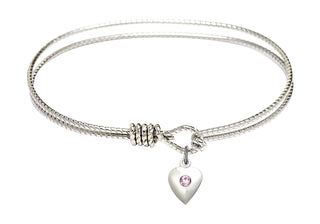 7 1/4 inch Oval Eye Hook Rhodium Bangle Bracelet with a Sterling Silver Heart charm.