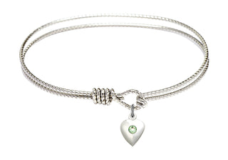 7 1/4 inch Oval Eye Hook Rhodium Bangle Bracelet with a Sterling Silver Heart charm.