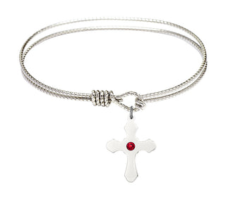 7 1/4 inch Oval Eye Hook Rhodium Bangle Bracelet with a Sterling Silver Cross charm.