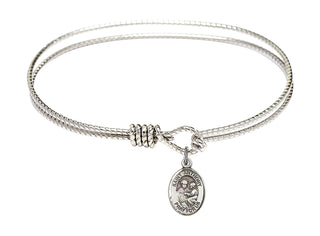 7 1/4 inch Oval Eye Hook Rhodium Bangle Bracelet with a Sterling Silver Saint Anthony of Padua charm. Engraved Catholic Saint Jewelry