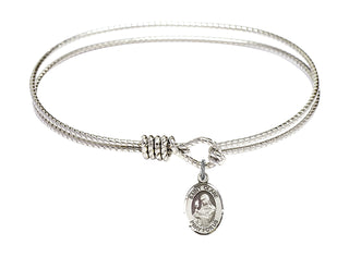 7 1/4 inch Oval Eye Hook Rhodium Bangle Bracelet with a Sterling Silver Saint Clare of Assisi charm. Engraved Catholic Saint Jewelry